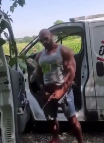 Muscle Hunk Pissing Outside With A Semi Hard Cock