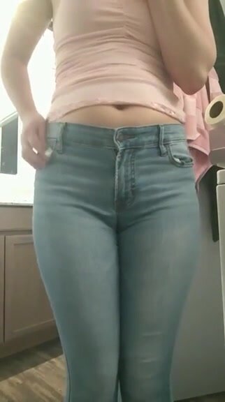 Girl peeing her jeans