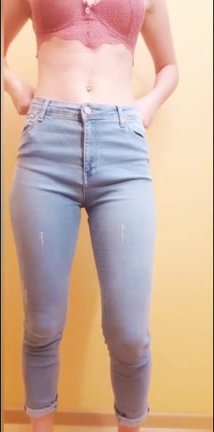 Cute girl pissing blue jeans