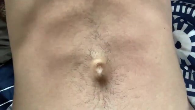Pushing belly button