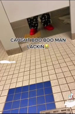 Black guy caught pooping