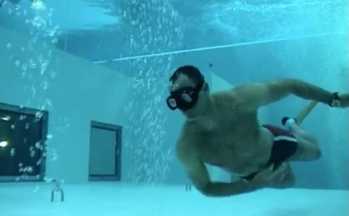 Speedo guys Freediving in Deep Pool.