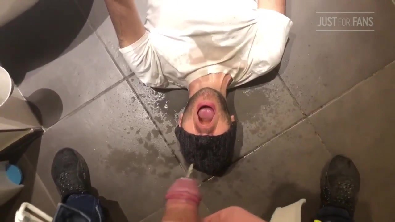 Pissed on by stranger in public toilet