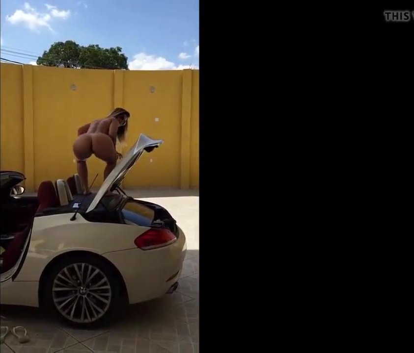 Completely naked girl dancing on car
