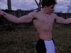 young white muscle  boy flexing