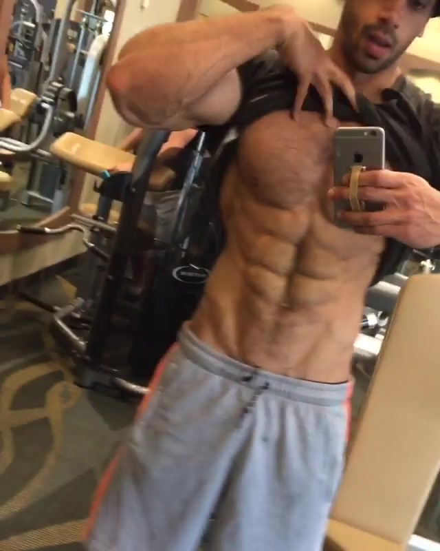 Cocky hunk Showing off In the Gym Mirror