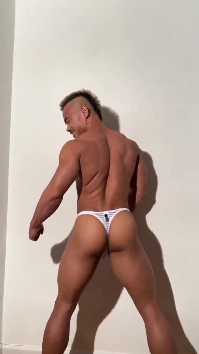 asian guy shakes his ass