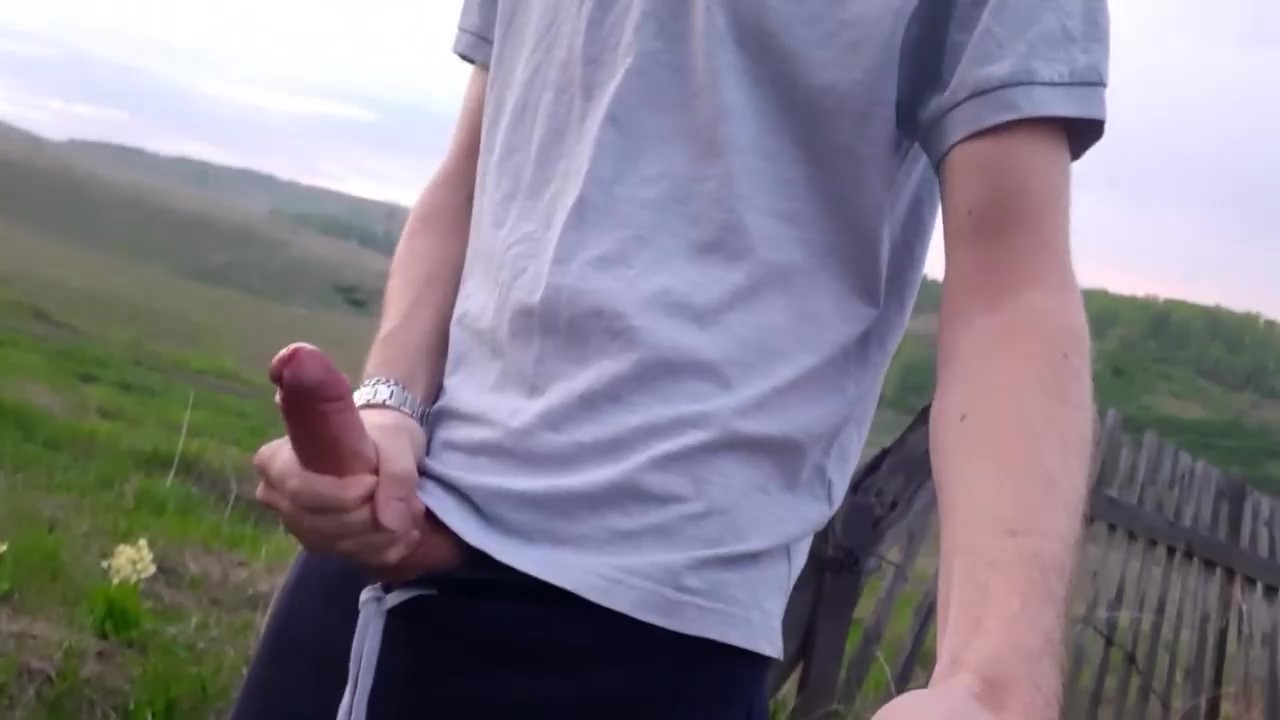 Hot boy wanks and cums in field