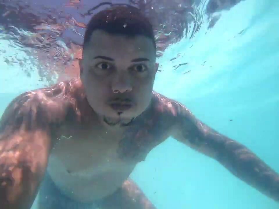 Brazilian cutie barefaced underwater in pool