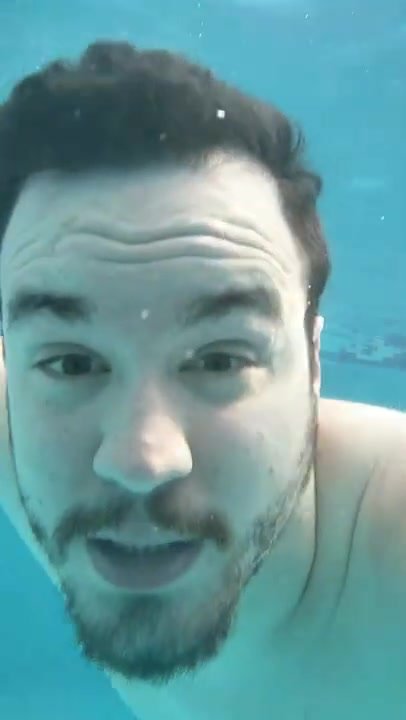 Bearded barefaced hottie out of air underwater