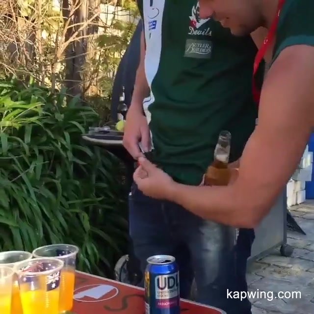 Aussie plays with mate's cock at BBQ