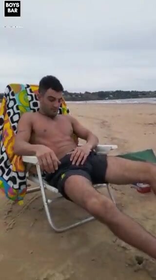 Hot surfer flashes his cock at beach