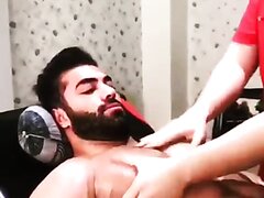 Muscle man getting his muscle tit massaged