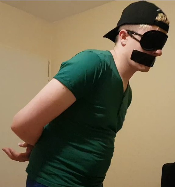 Blindfolded, he is led  to stranger man and must make him a blowjob...