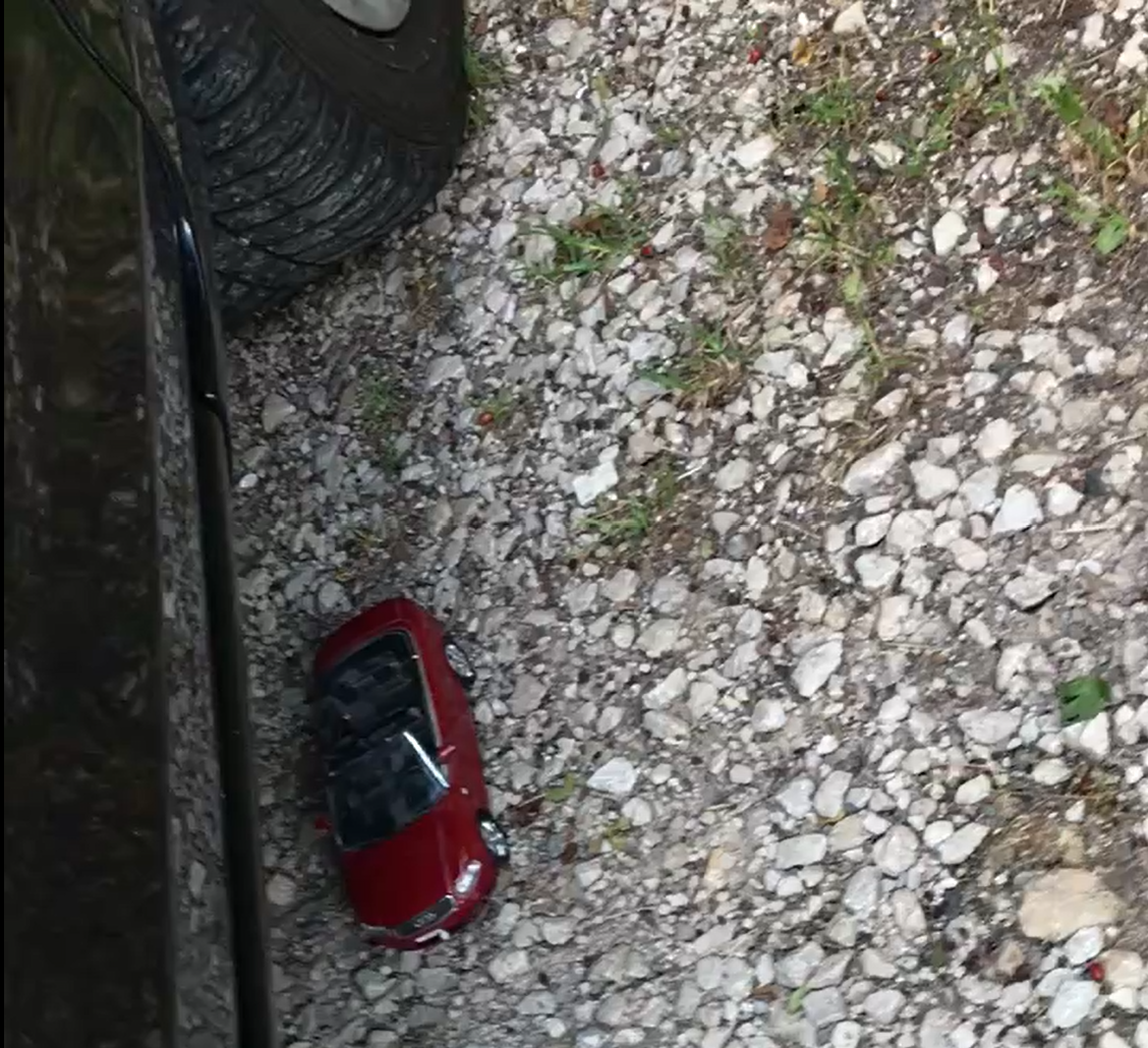 Toy crushed under car