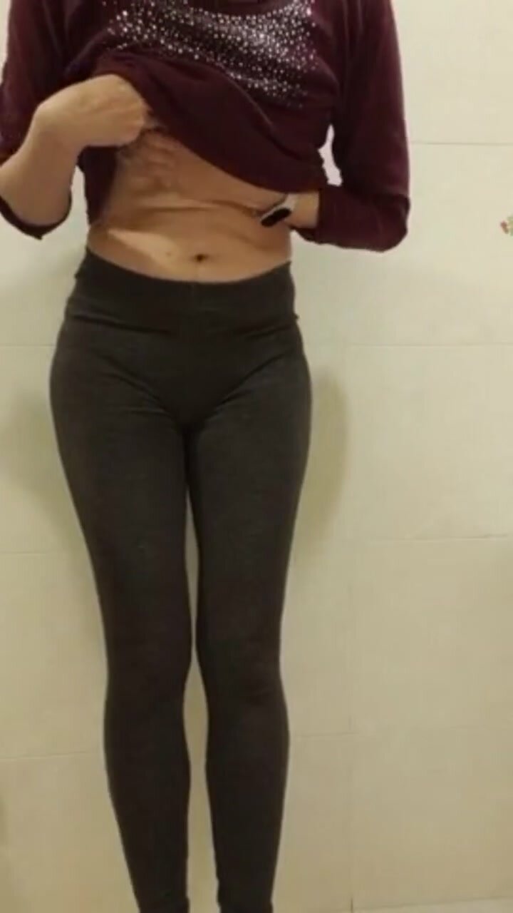 Pissing her gym pants
