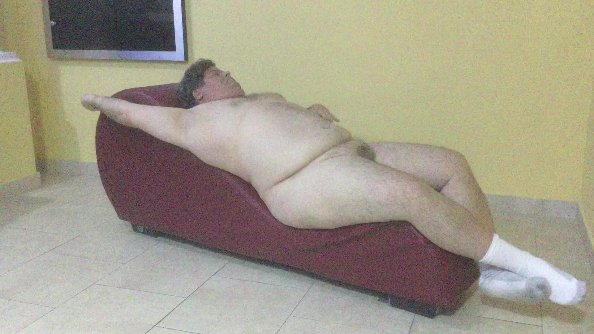 Chubby man plays with his tiny dick