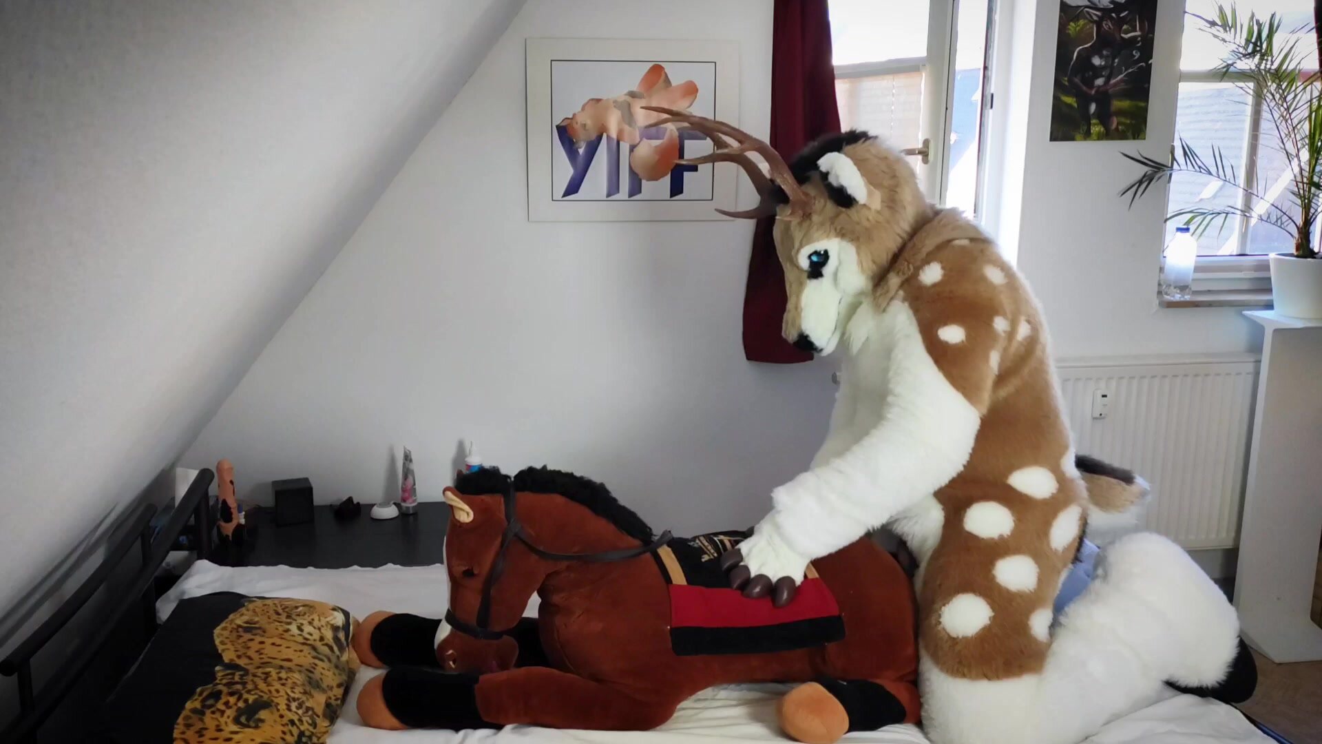 Deer fursuiter pissing and cumming on plush horse