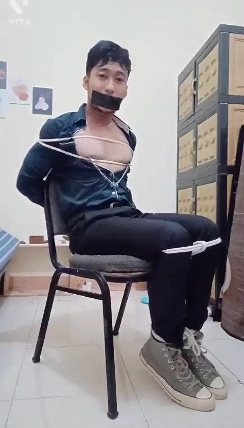 Chair Tied Indo Guy Struggling