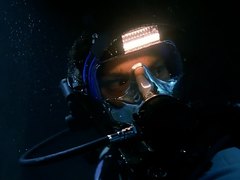 Full Face Mask Scuba Divers inside Wreck
