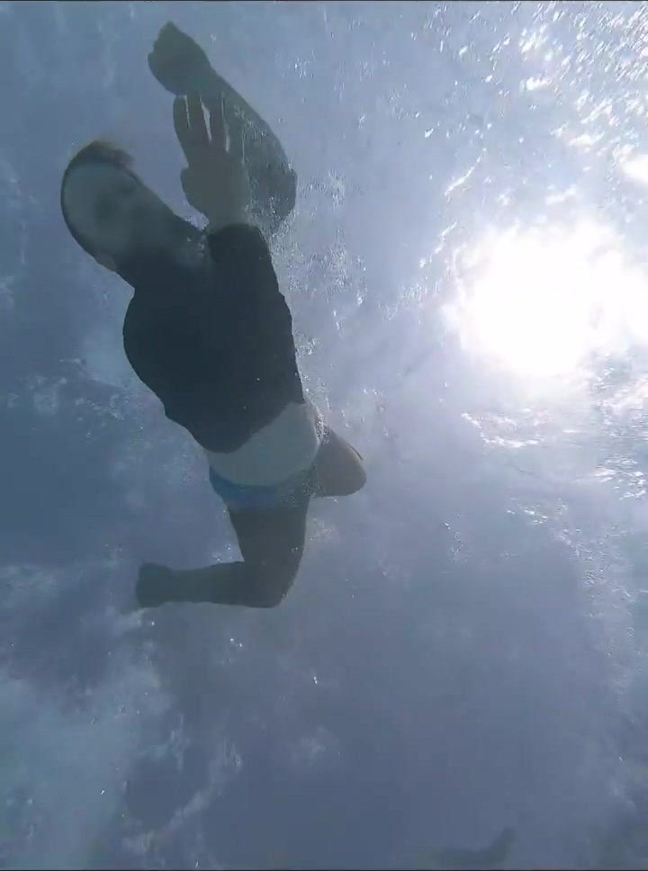Underwater barefaced redhead merman - video 2