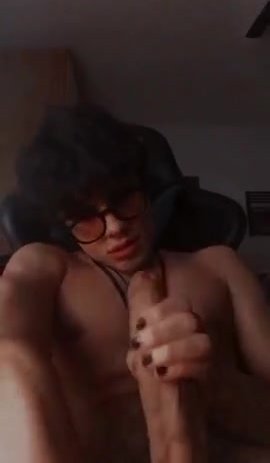 Eboy stroking his long monster cock