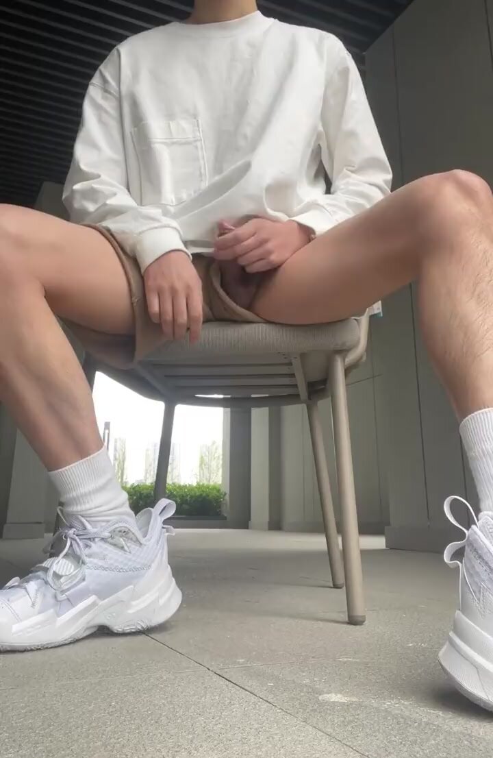 Sitting on a chair in public and shooting a load far
