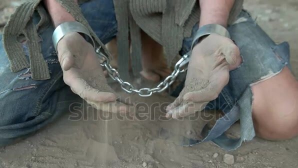 a-prisoner-in-chains-on-his-knees