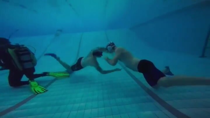 Underwater russian fighters in pool