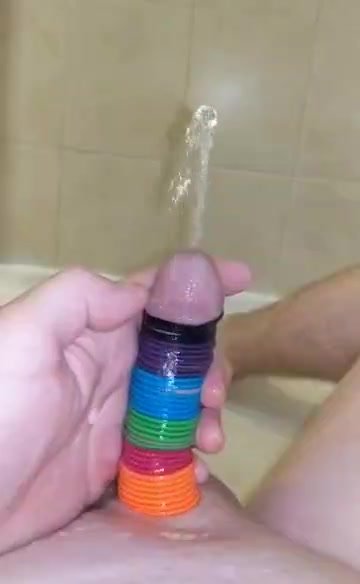 Pissing rainbow cock