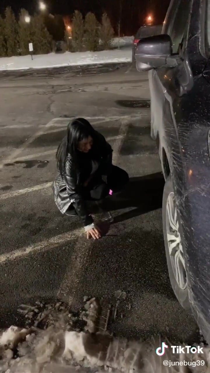 Girl pee in parking lot