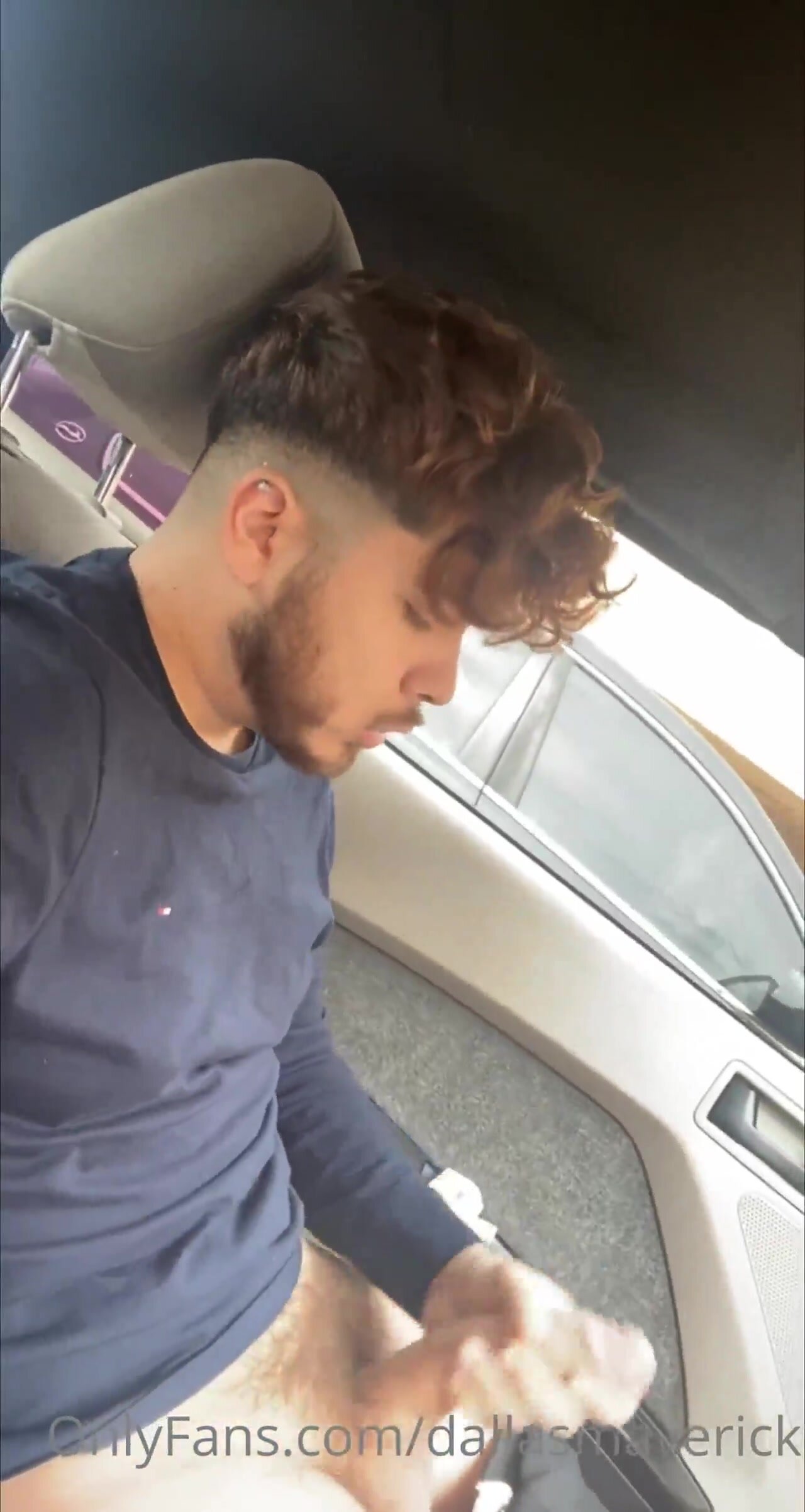 Jerking in his car