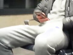 Guy playing with his dick in public