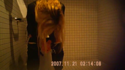 girl hovering on the toilet