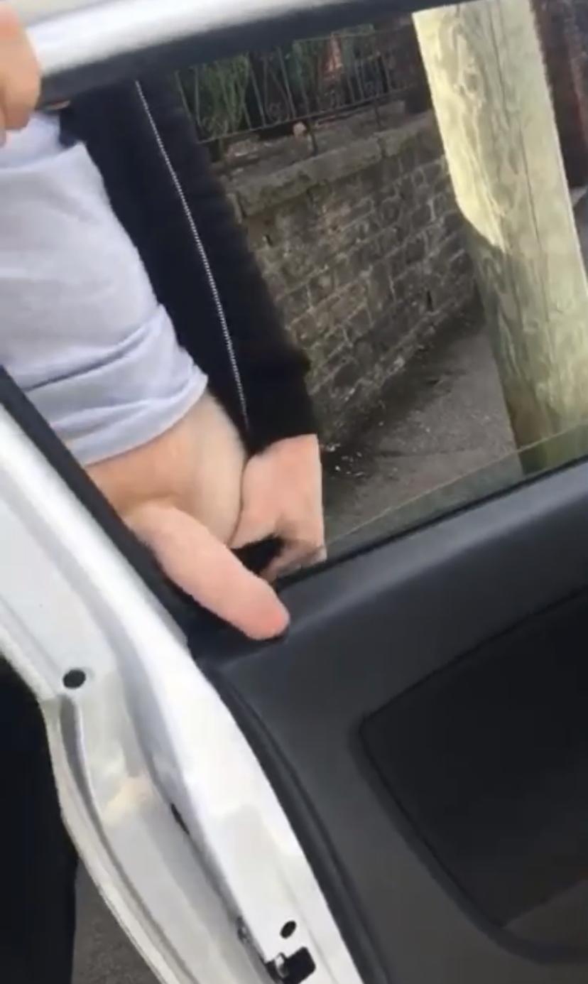 Hung lad gets his willy caught in car window