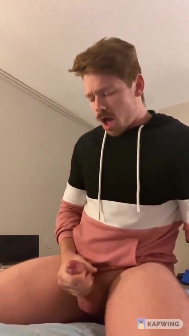 Handsome stud jerks off and cums on bed