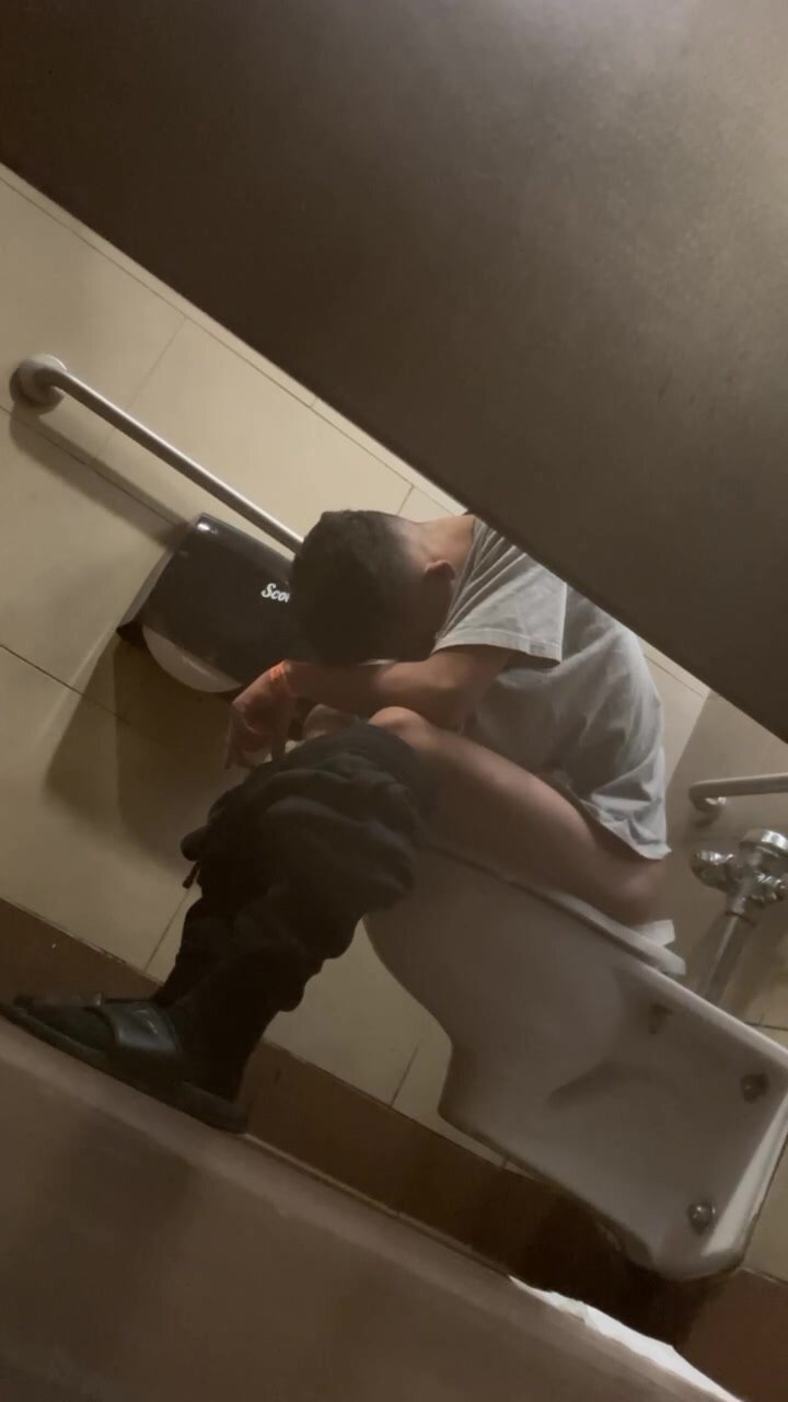 Young man poops at the mall