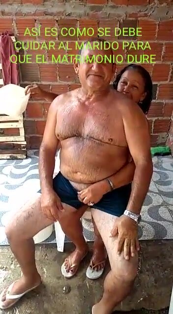 Old Man is being washed by wife and gets a boner