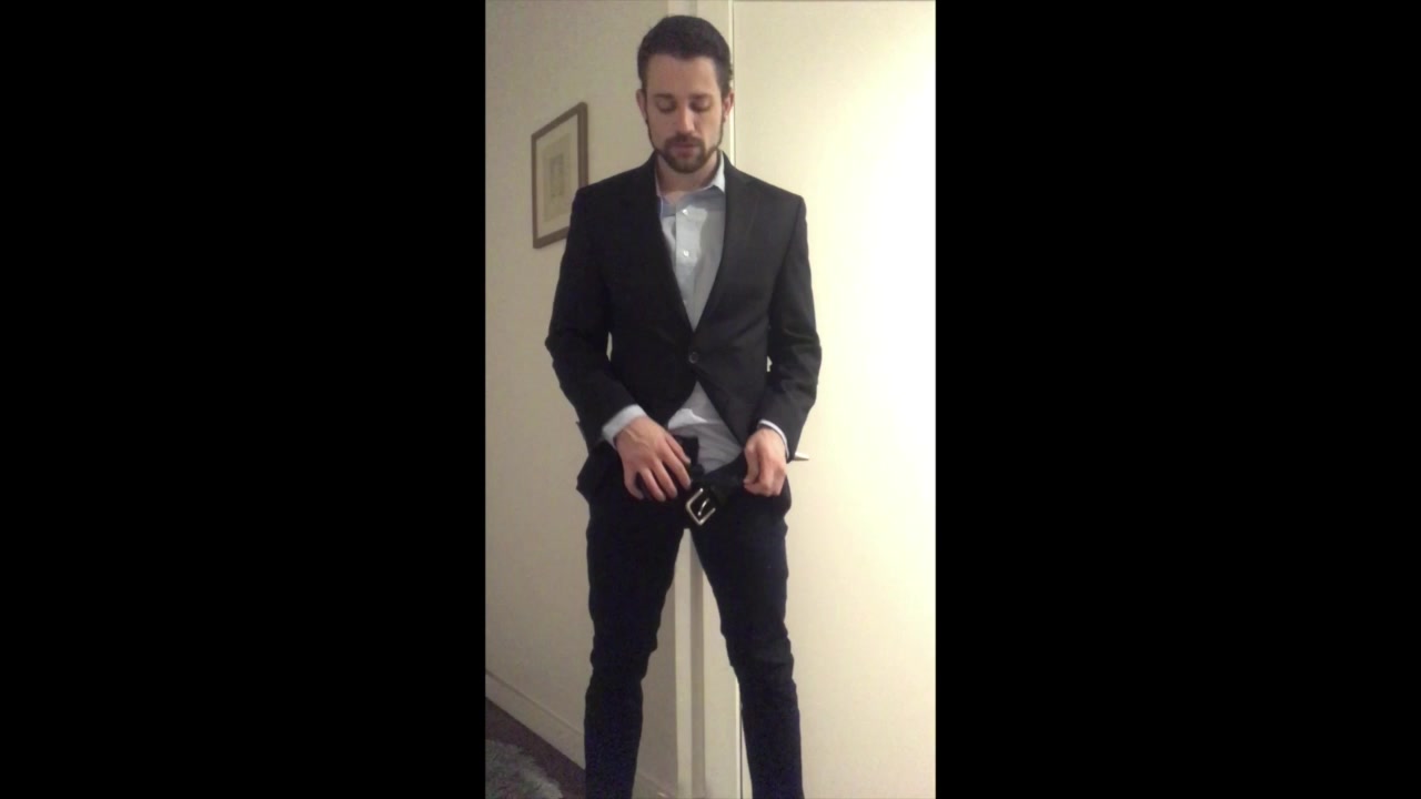 suited hunk shows off his ass