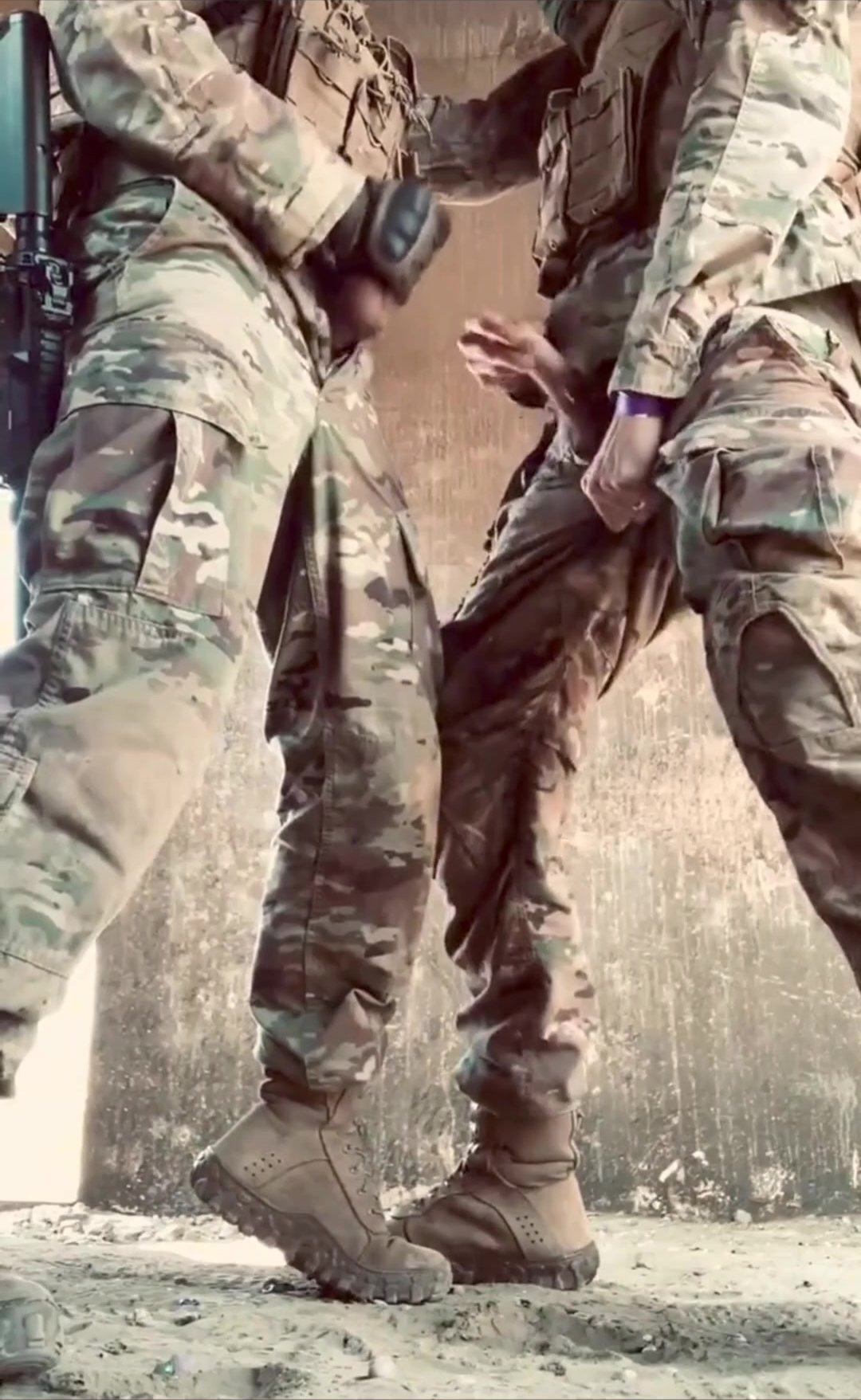 Two soliders have fun