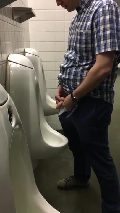 young uncut softie pissing in urinall