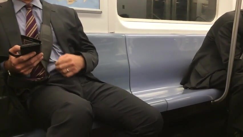 Suited bulge in subway