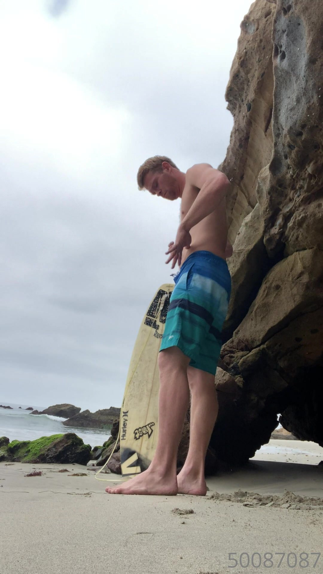 Hot surfer shows off cock and jerks off at beach