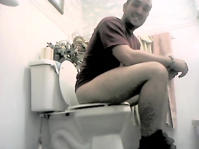 Handsome guy on the toilet