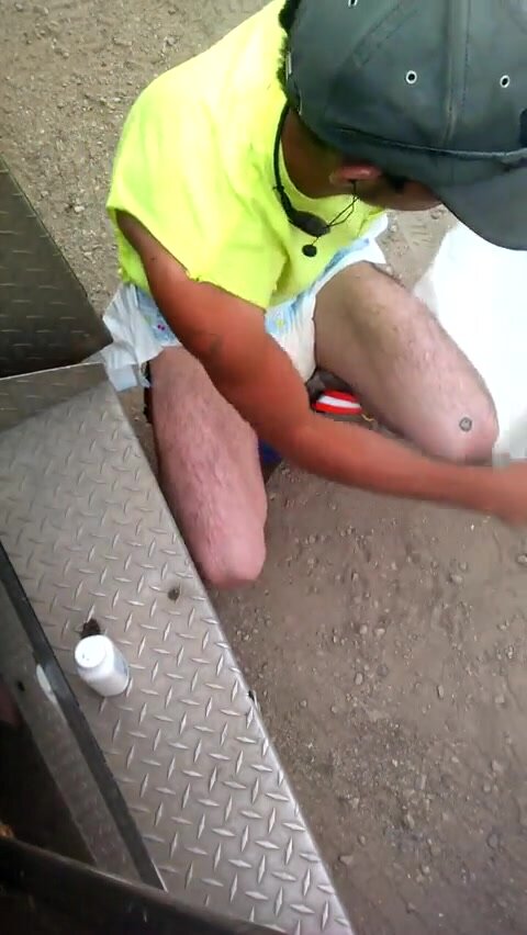 construction worker diapers himself in public