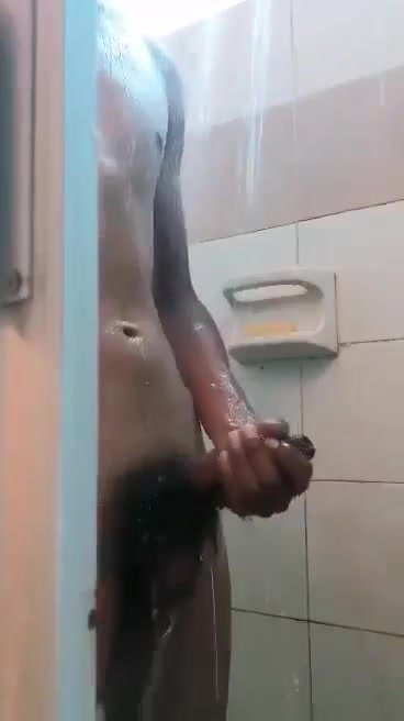 straight Latin boy taking a shower