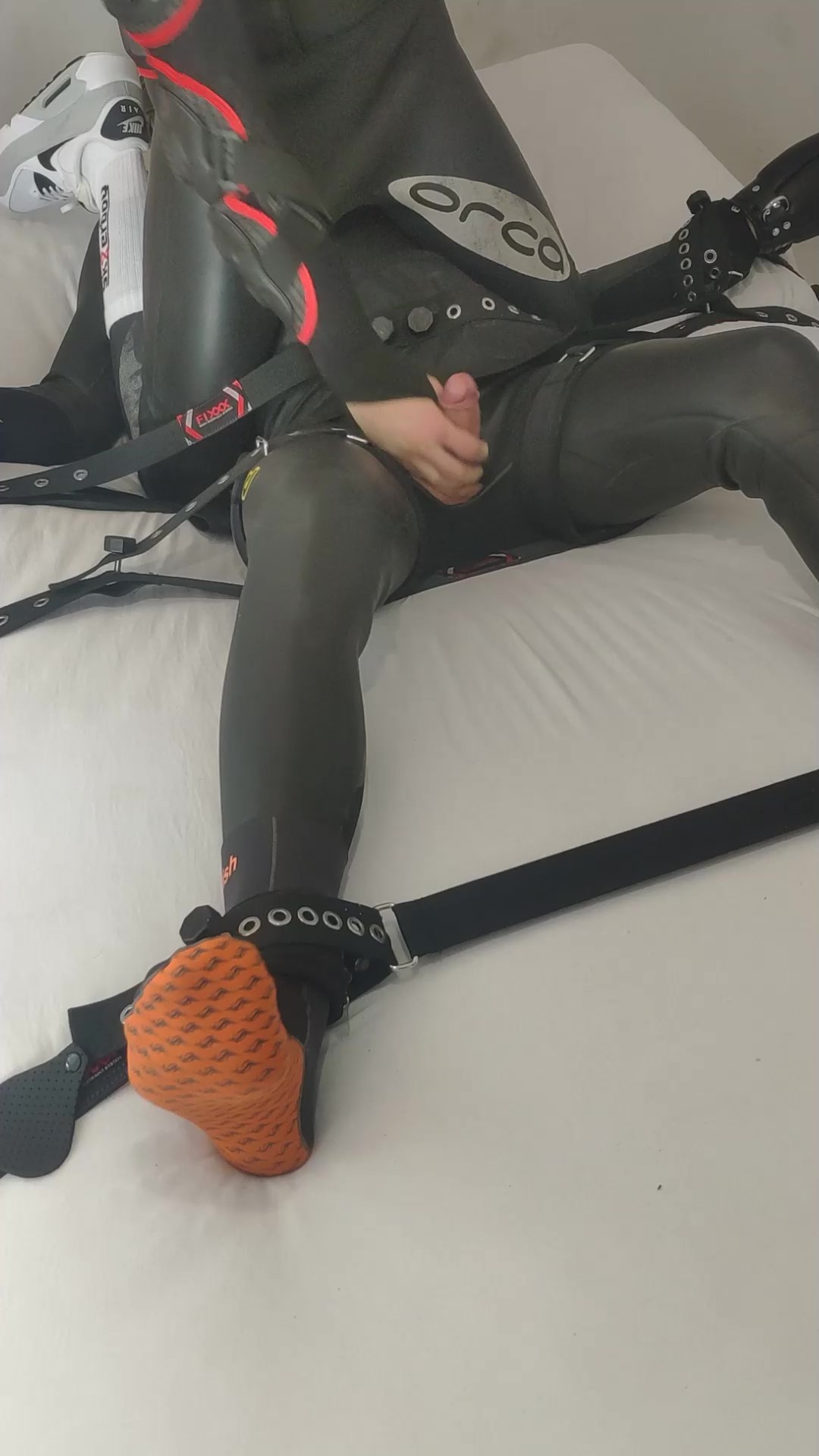 Gay wetsuit bondage