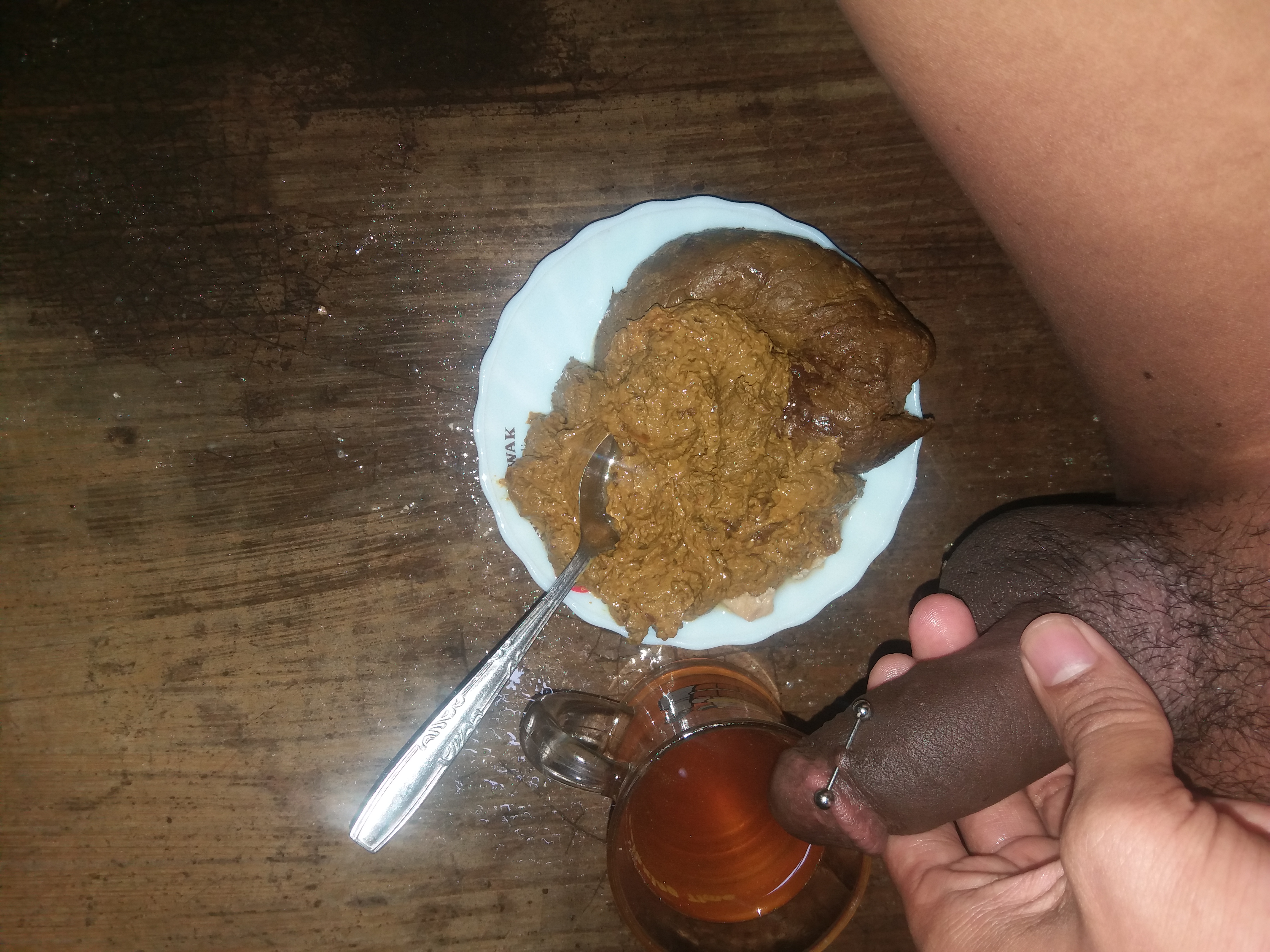 Indonesia's slave breakfast with his shit and piss