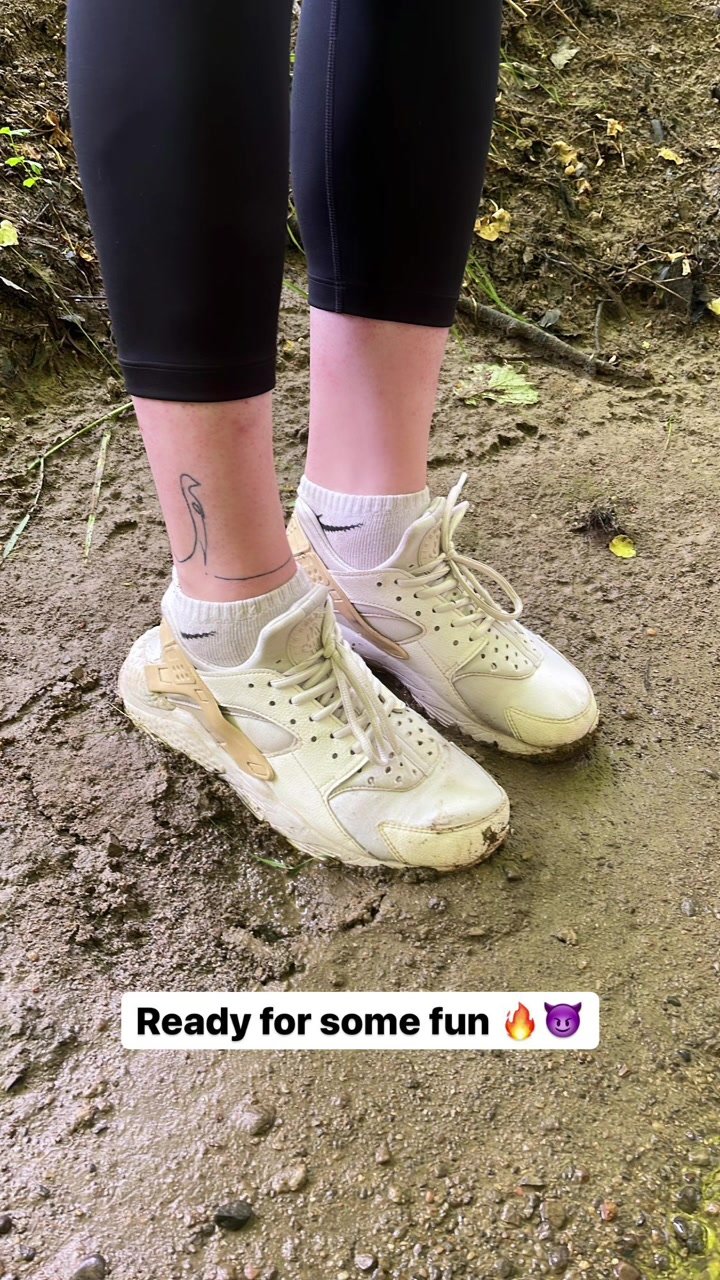 clothed messing in the lake - leggins, sneakers and mud