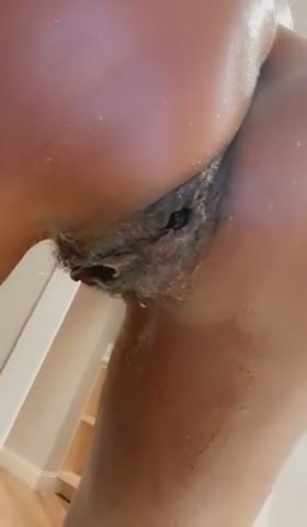 Girl  shitting  very constipated  turd in the toilet